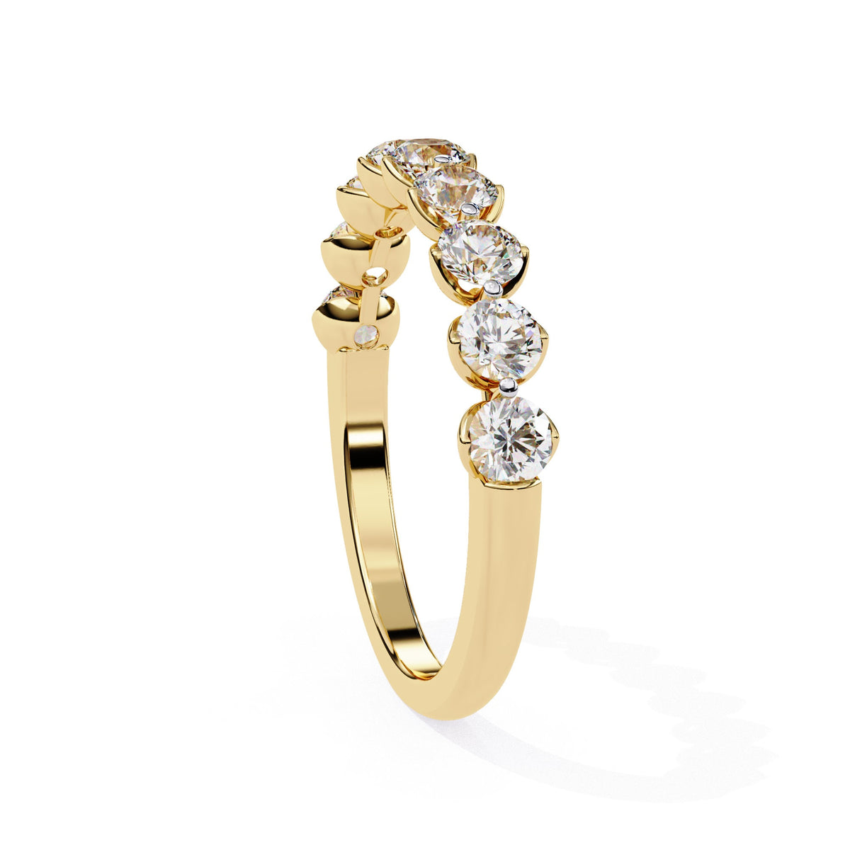 a gold ring with nine diamonds on it