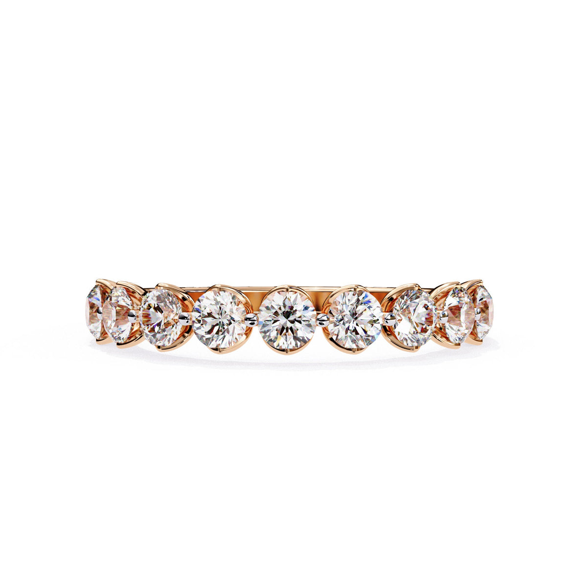 a gold ring with nine diamonds on it
