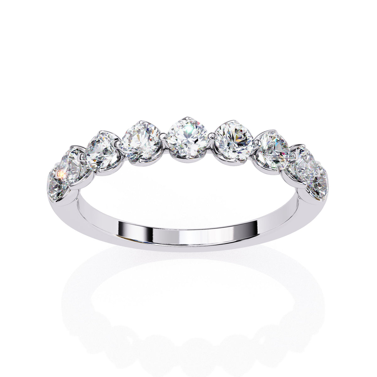 a gold ring with nine diamonds on it