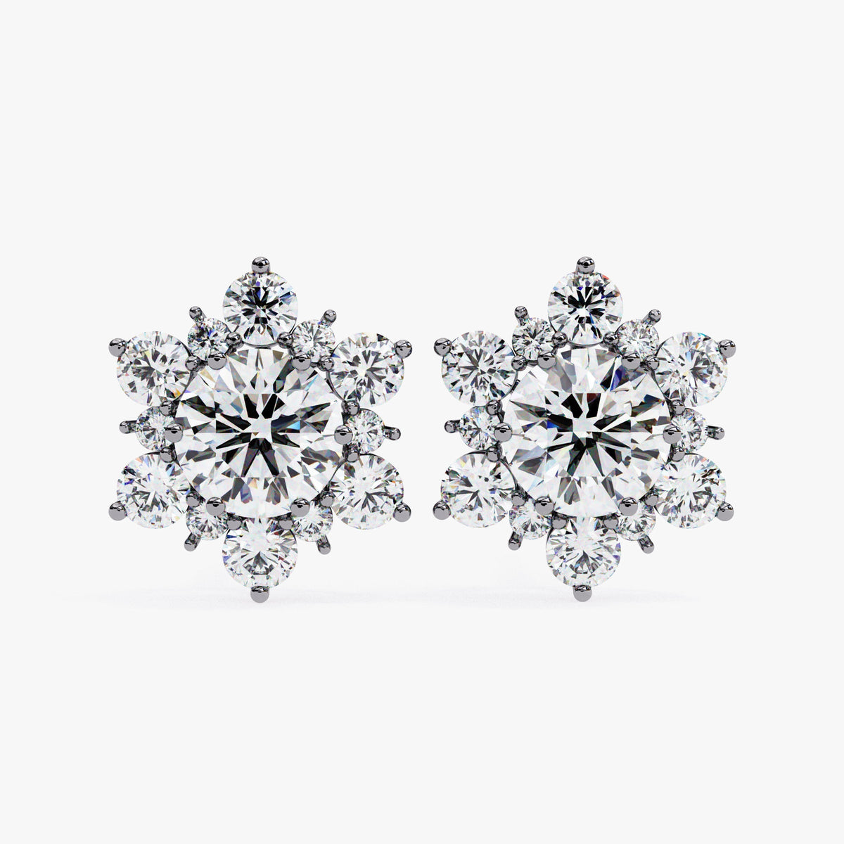 Front view of the snowflake earrings in black gold, showing the symmetrical cluster of round diamonds in a six-pointed design.