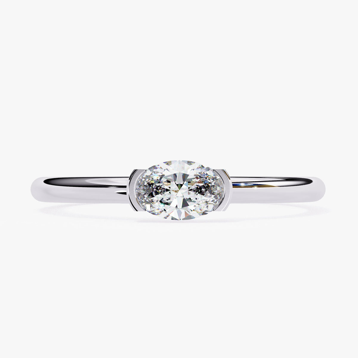 0.30Ct East West Oval Diamond Ring: 14k Gold Bezel Solitaire