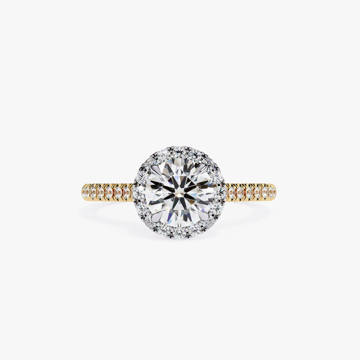 A 14K gold engagement ring with a round center diamond surrounded by a halo of smaller diamonds. The band is set with smaller diamonds and has a two-tone design with a yellow gold band and a white gold halo.
