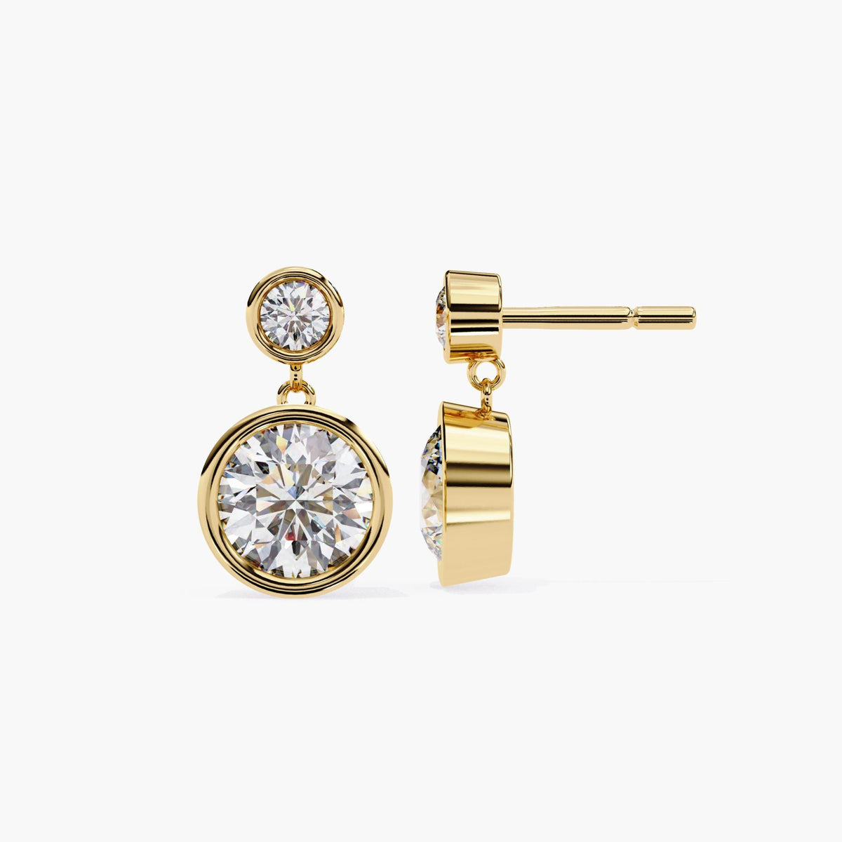 Side and front view of 14k yellow gold drop earrings with bezel-set round lab grown diamonds. These minimalist dangle studs feature a double diamond design, perfect as modern wedding earrings, anniversary gifts, or fine jewelry for women.