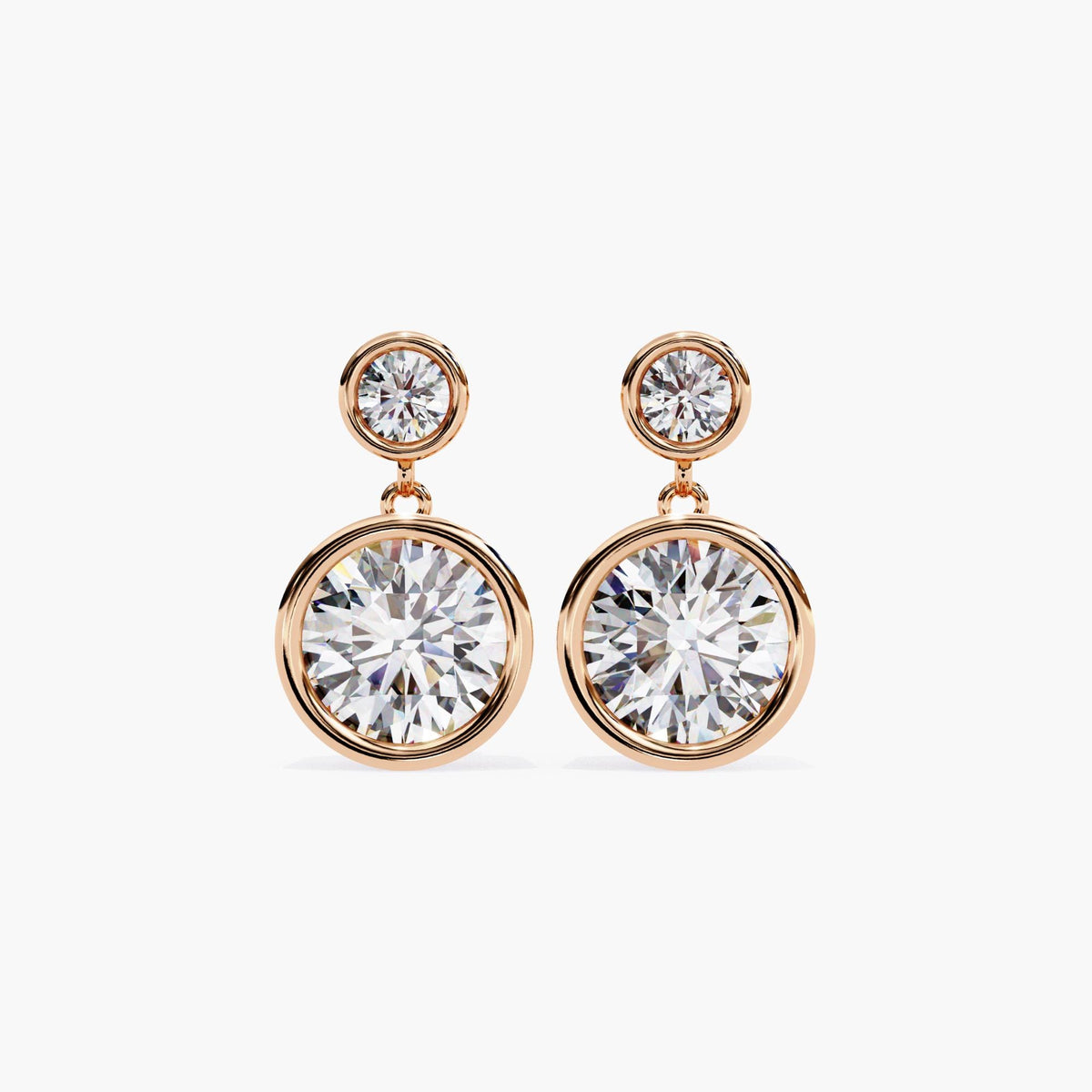 Front view of 14k rose gold lab grown diamond earrings with bezel-set round stones in a double drop design. A timeless jewelry gift for her, perfect for weddings, special events, or minimalist everyday wear.