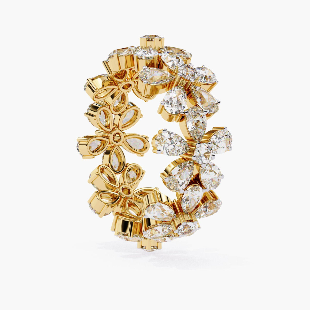 Angled view of 14k yellow gold daisy floral eternity ring with pear and round lab grown diamonds in a full circle design. The intricate flower clusters create a bold statement band, ideal for weddings, anniversaries, or floral-inspired fine jewelry lovers.