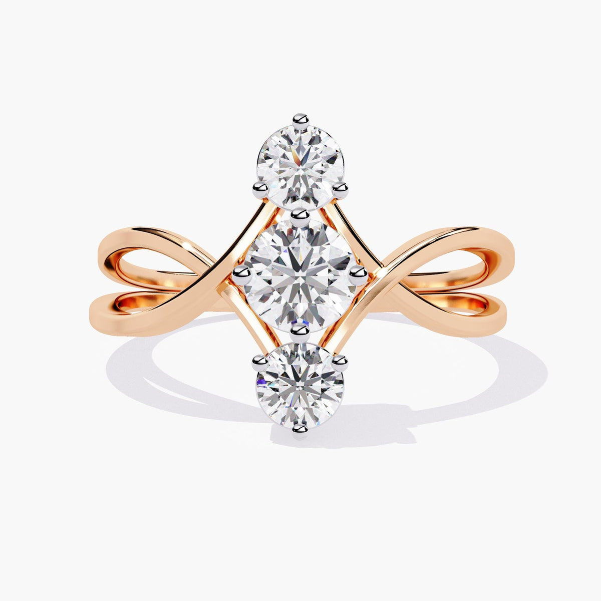 A rose gold ring with three diamonds in the center.