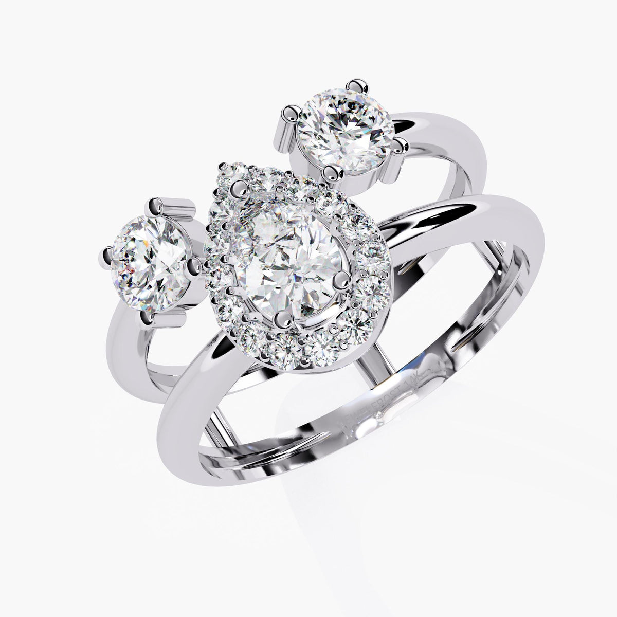 A three stone ring with a large center pear brilliant cut diamond and two smaller round brilliant cut diamonds on either side.