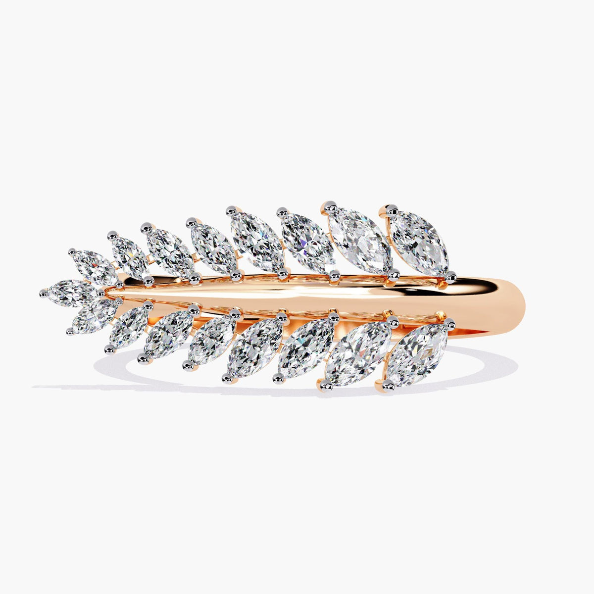 A rose gold ring with a leaf design and small diamonds.