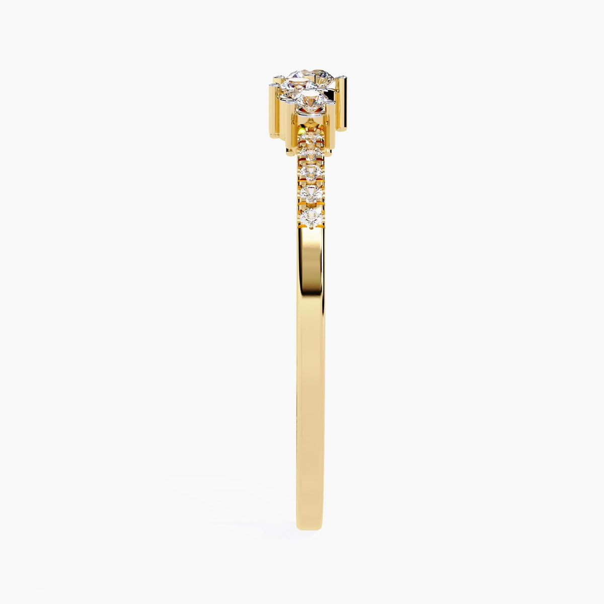 A yellow gold band ring with a row of small diamonds and five larger diamonds in the center.