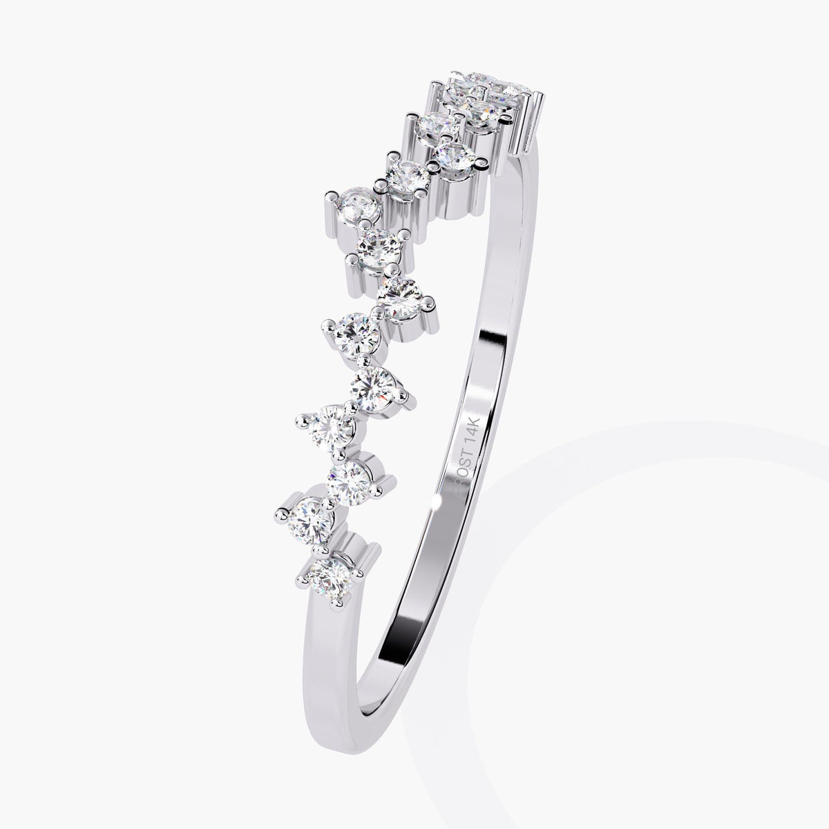 A white gold ring with a row of round diamonds set in a delicate band.