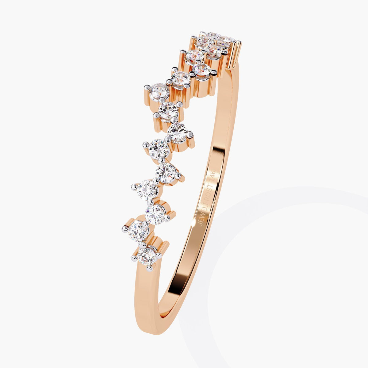A rose gold ring with a row of round diamonds set in a delicate band.