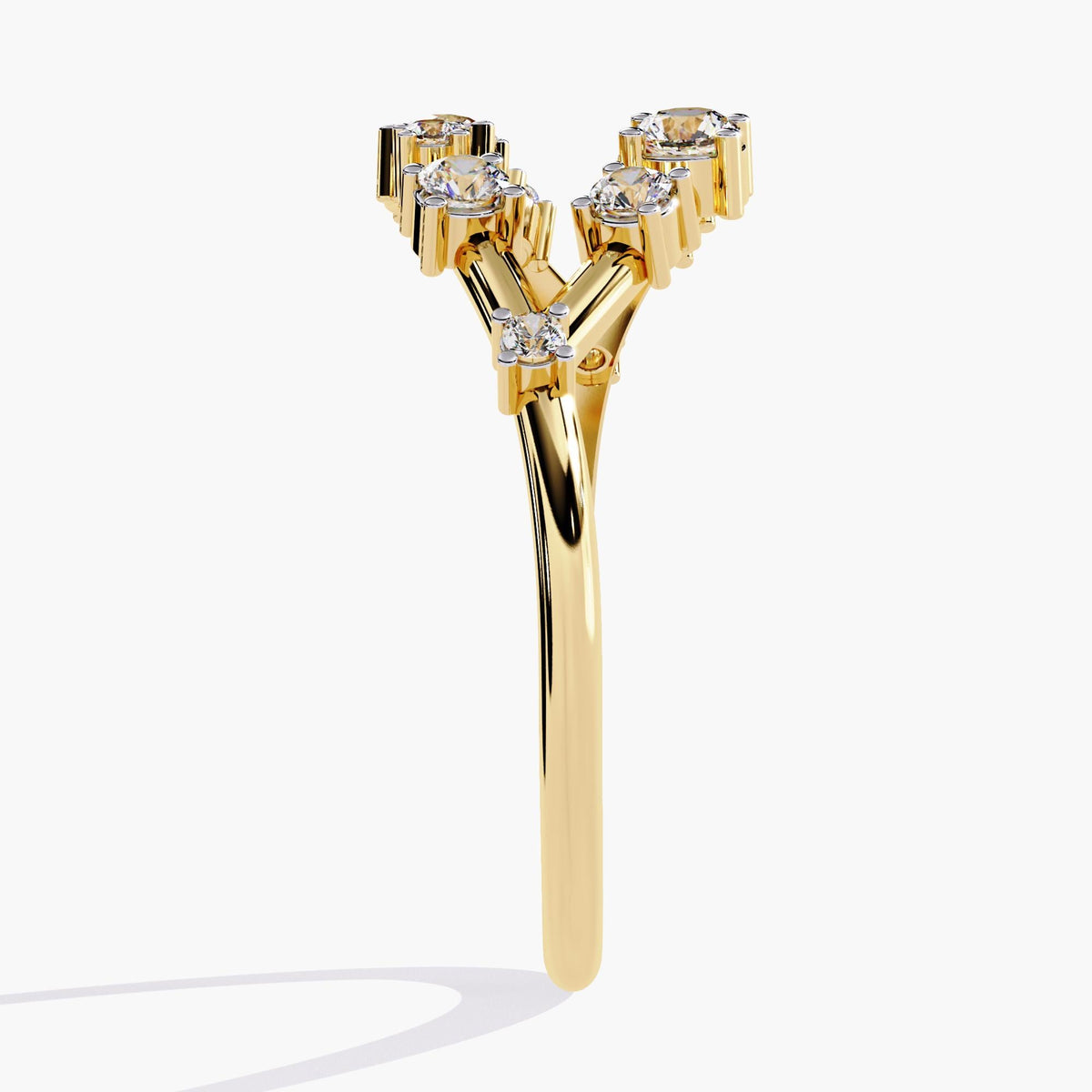 A yellow gold band with alternating round-cut diamonds set in a delicate open-band arrangement.