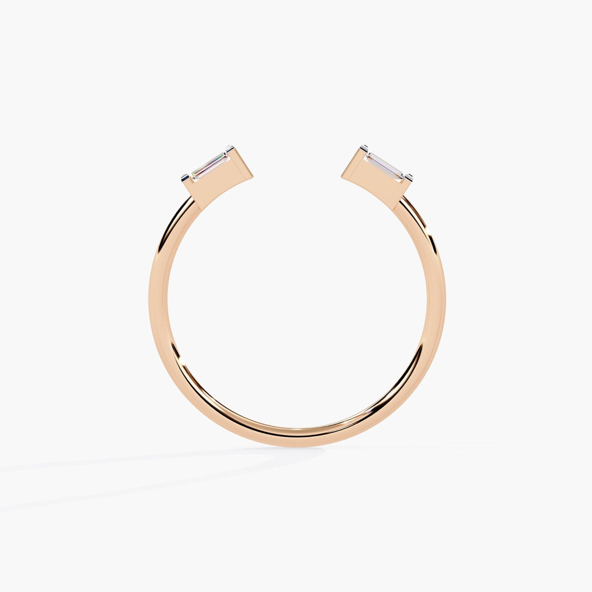 Back view of a 14k rose gold open ring with two bezel-set baguette diamonds, showcasing the open band silhouette and polished finish.