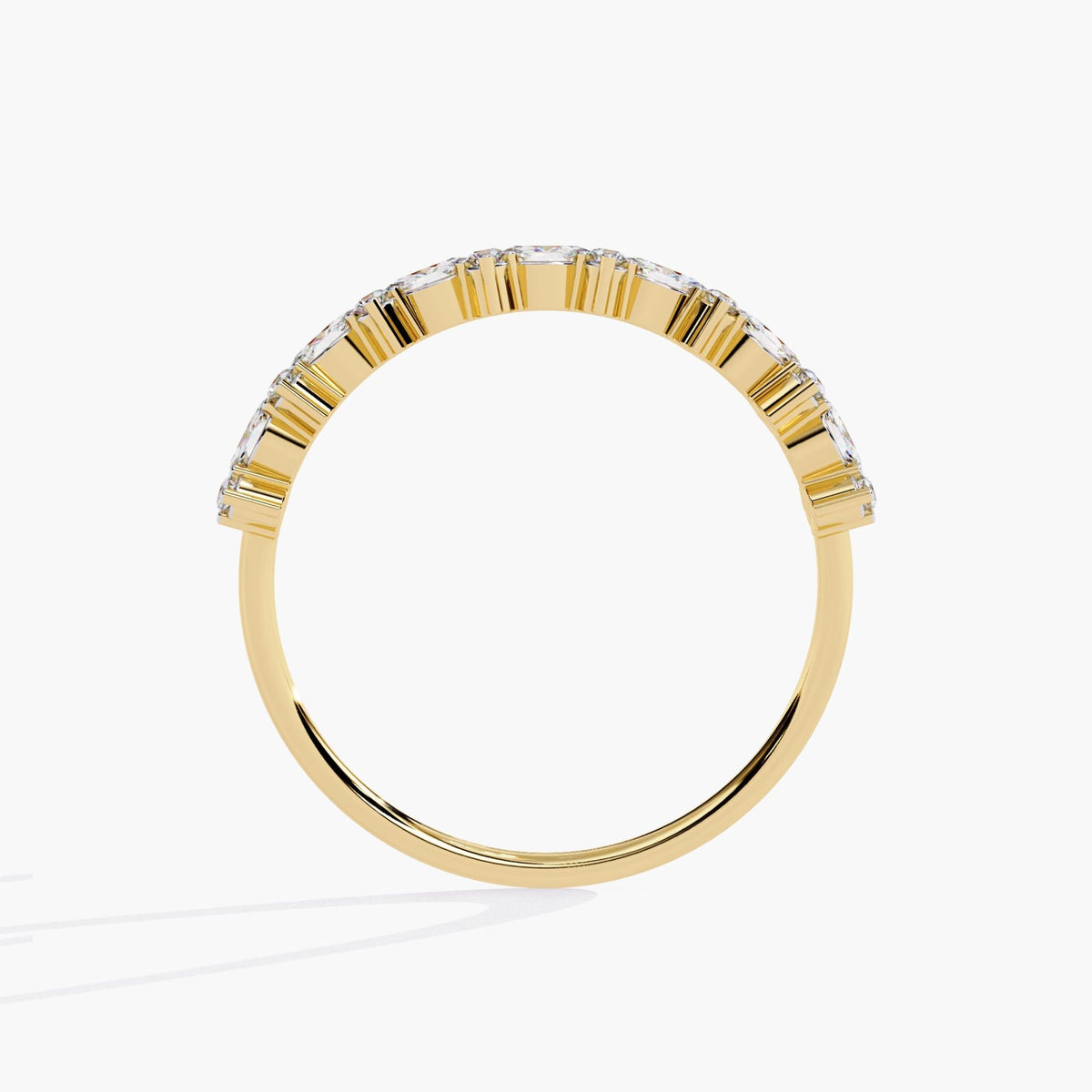 Side profile of a 14k yellow gold diamond ring showing the horizontal marquise and round diamonds set in floral clusters across the top half of the band.