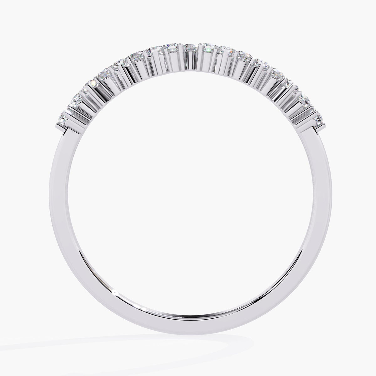 Top view of a 14k white gold curved band with 17 round natural diamonds set in a half-eternity prong design.