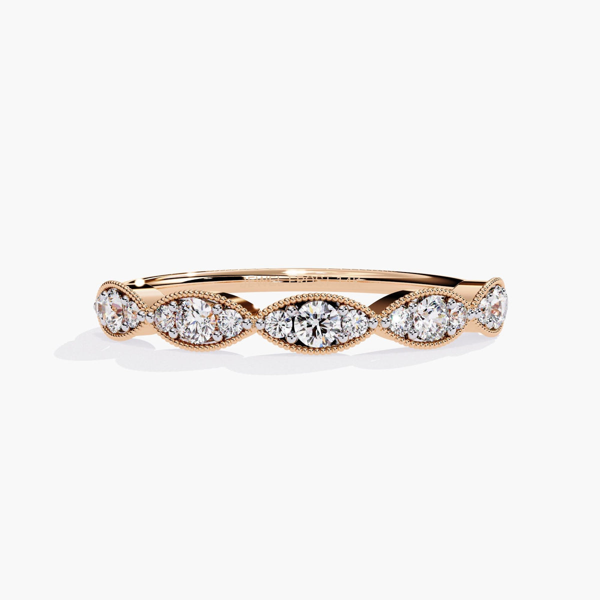 Front view of a 14k rose gold band featuring five marquise-shaped bezels, each set with three round lab-grown diamonds. The soft pink tone and delicate milgrain detailing give the ring a romantic, vintage-inspired feel. A thoughtful gift for anniversaries, weddings, or everyday fine jewelry.