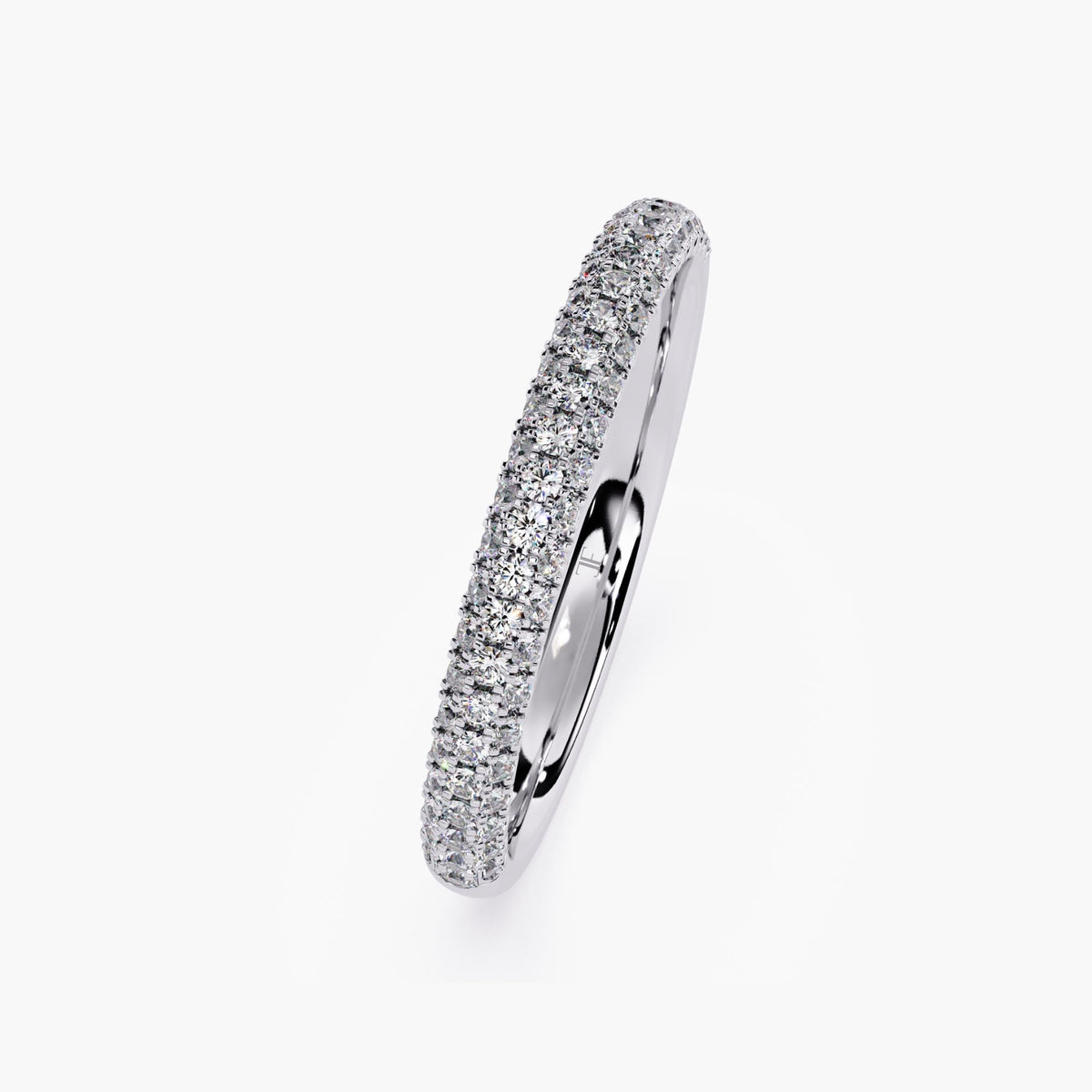 A white gold band featuring a row of small, clear diamonds set around half of the band.