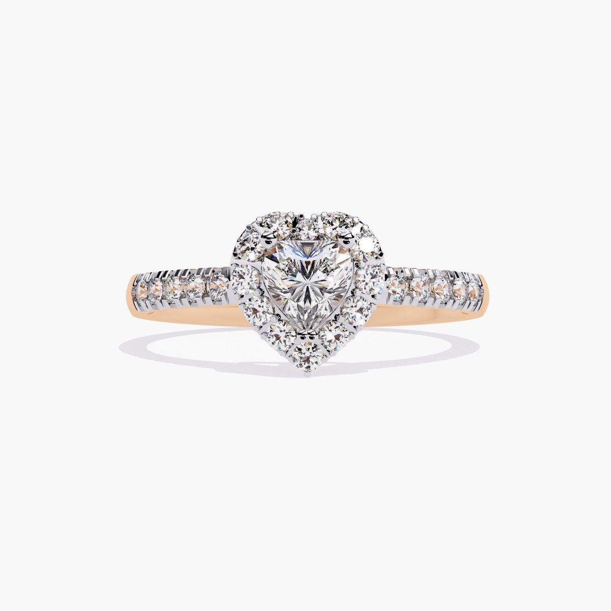 A heart-shaped diamond engagement ring with a halo setting and a rose gold band.