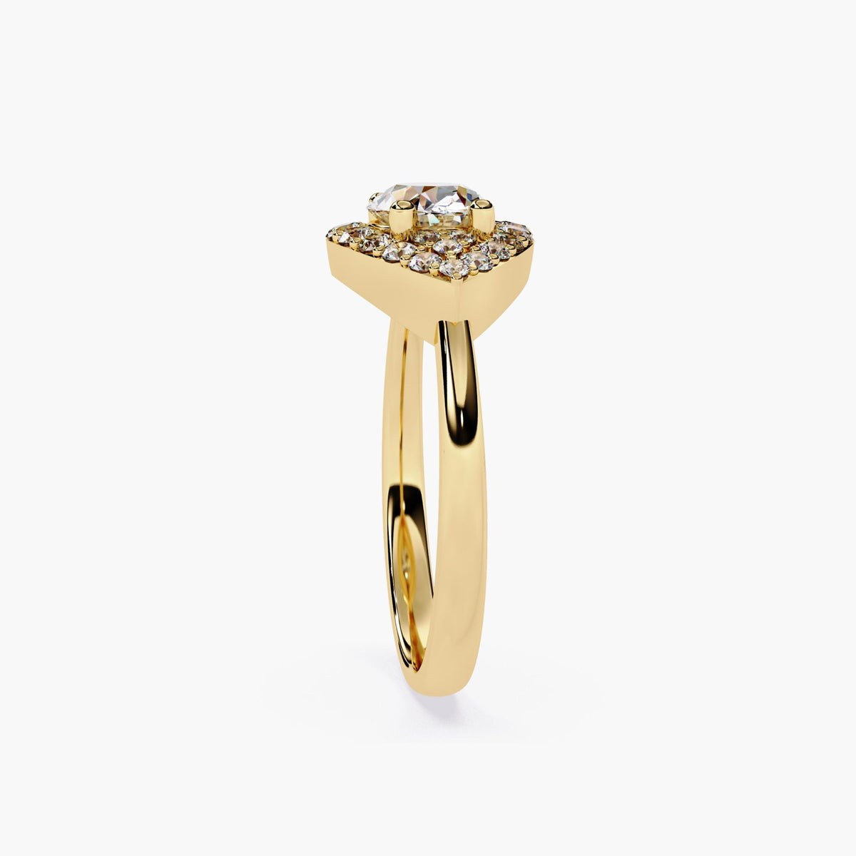 A gold engagement ring with a marquise cut diamond center stone and a halo of smaller diamonds.