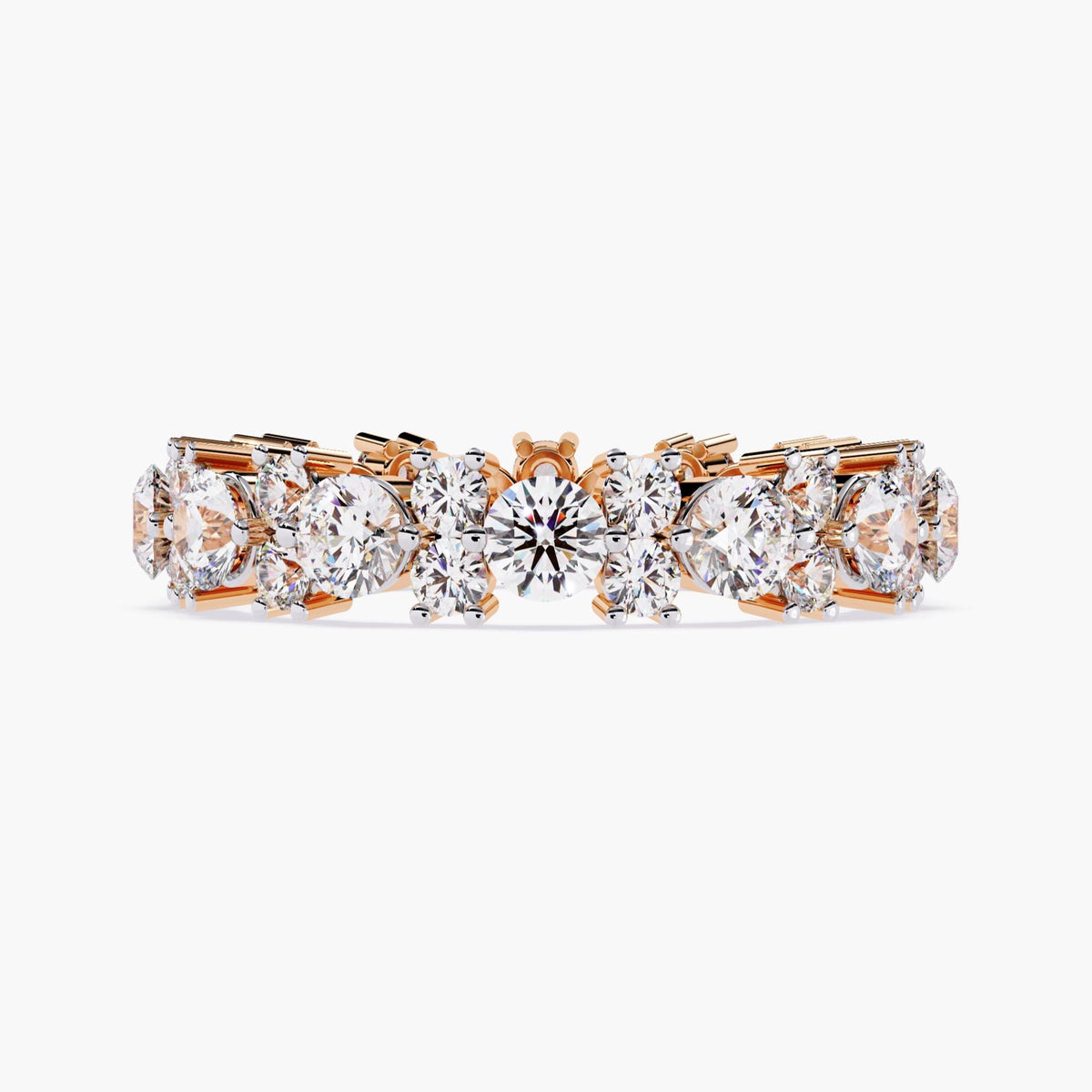 A rose gold full eternity ring with round cut diamonds in different sizes.