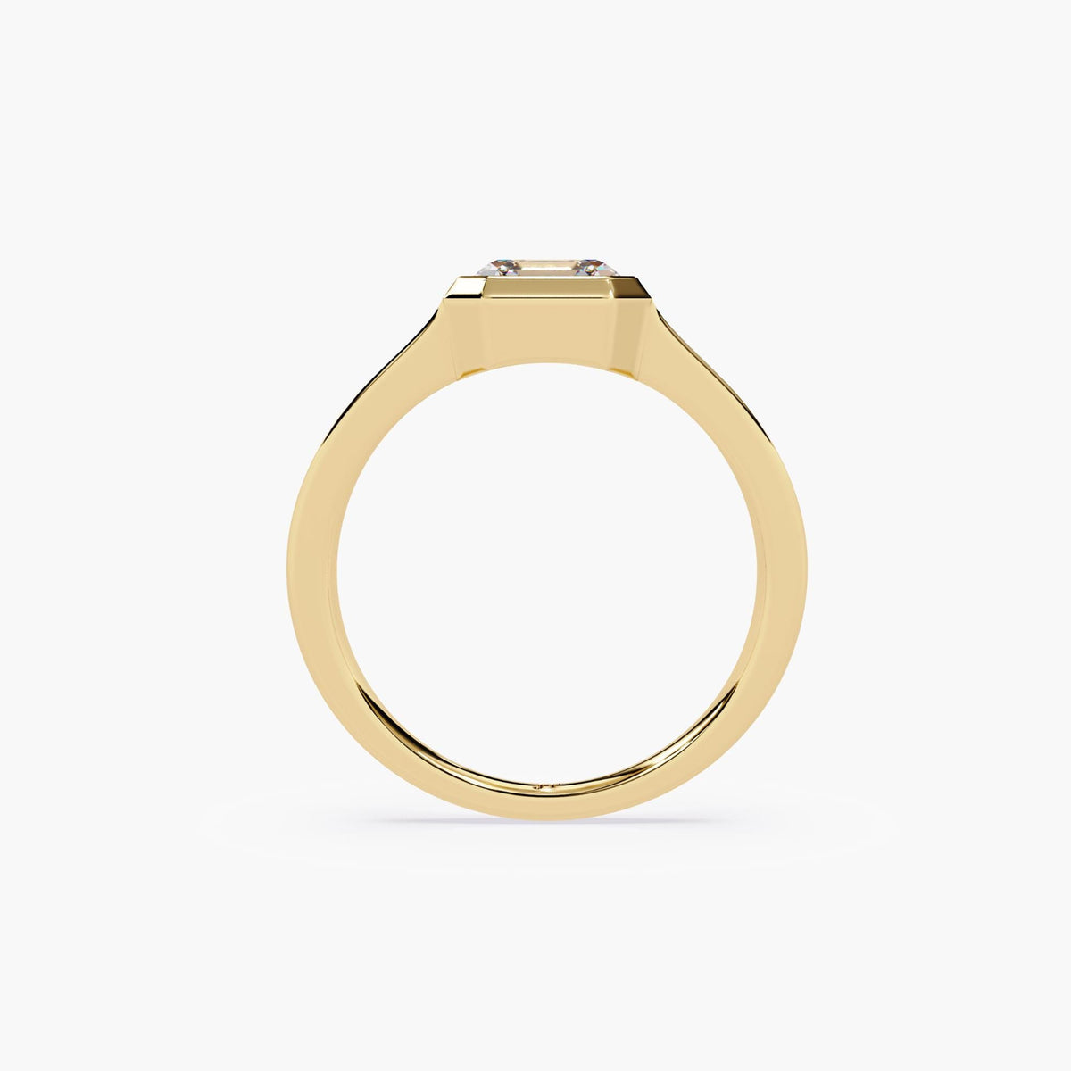 A gold asscher signet ring.