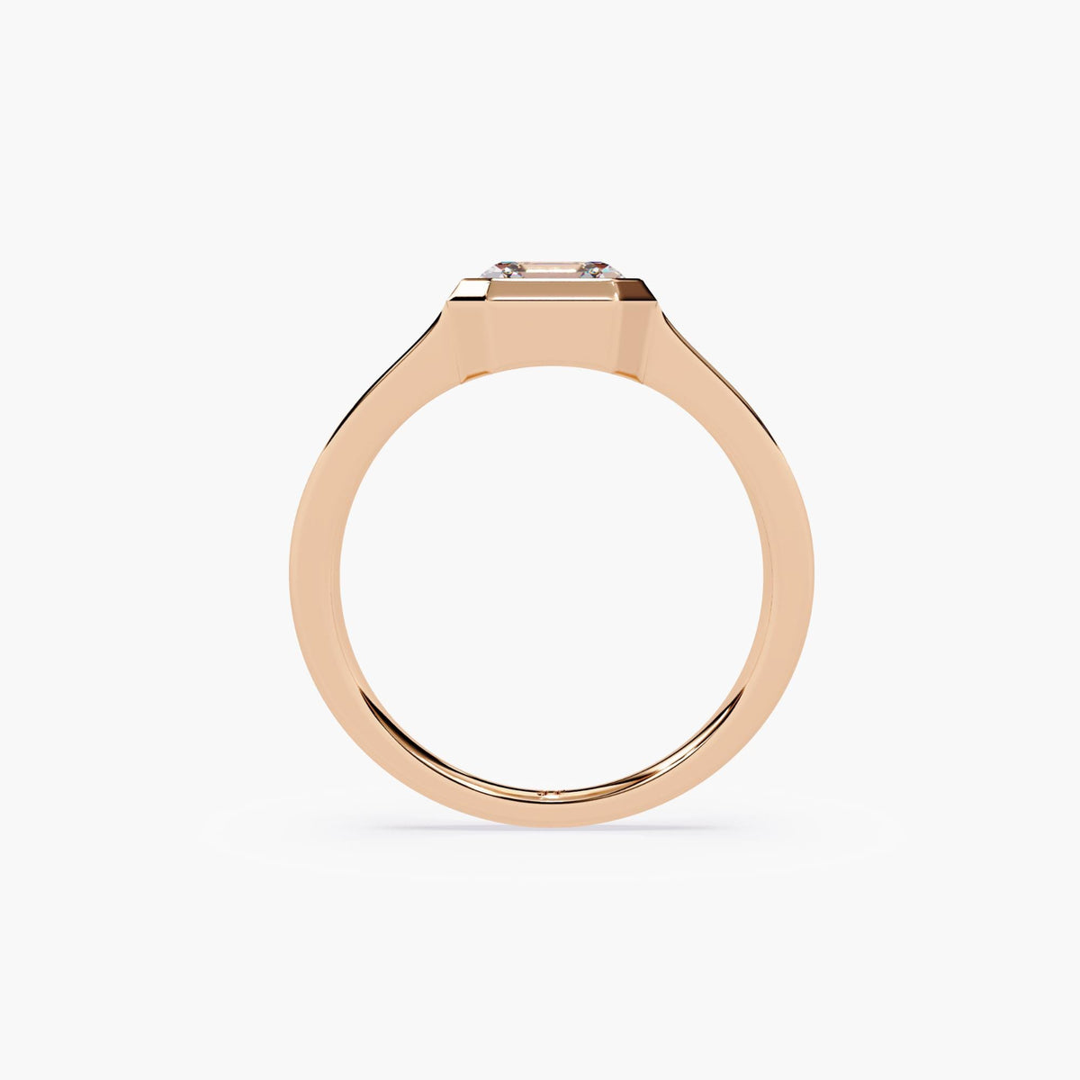 A rose gold asscher signet ring.