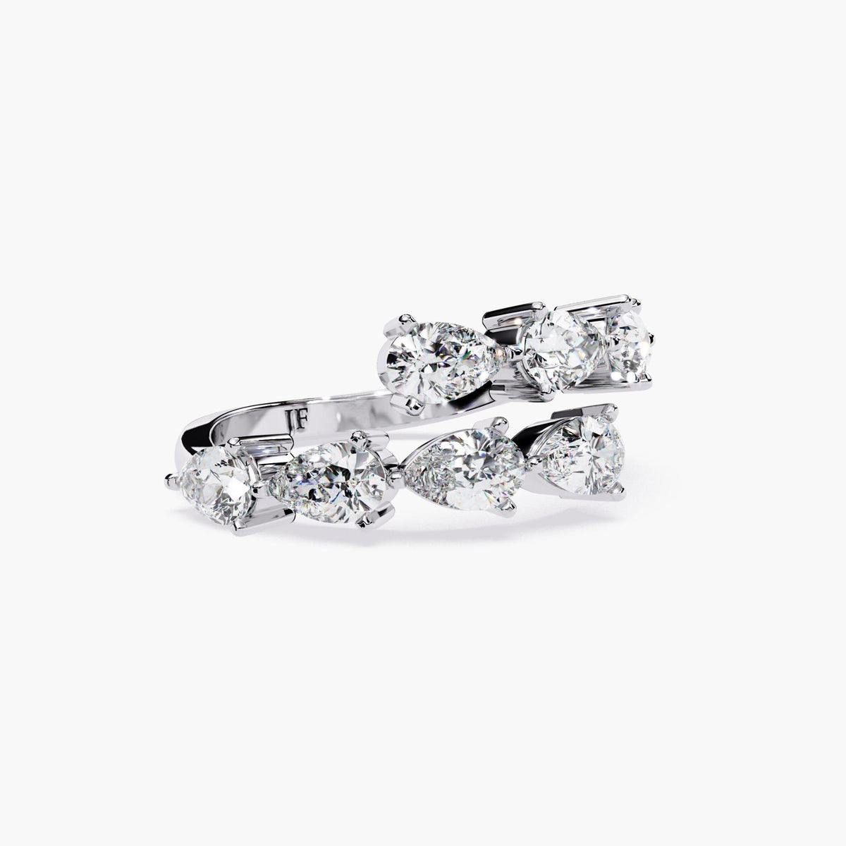 14k white gold wrap ring featuring pear cut lab grown diamonds in a prong setting. The open spiral design creates a mirrored bypass look with high-shine metal finish.