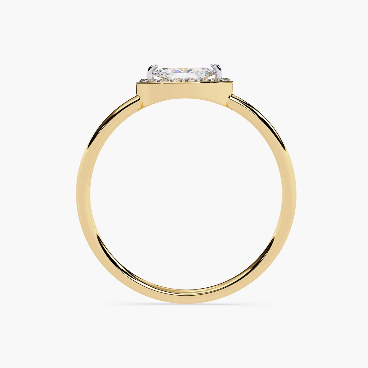 14k yellow gold marquise halo ring, showing the flat basket setting that holds a horizontally-set marquise diamond. The low-profile design sits close to the finger, making it comfortable for everyday wear while still offering a graceful, elevated look.