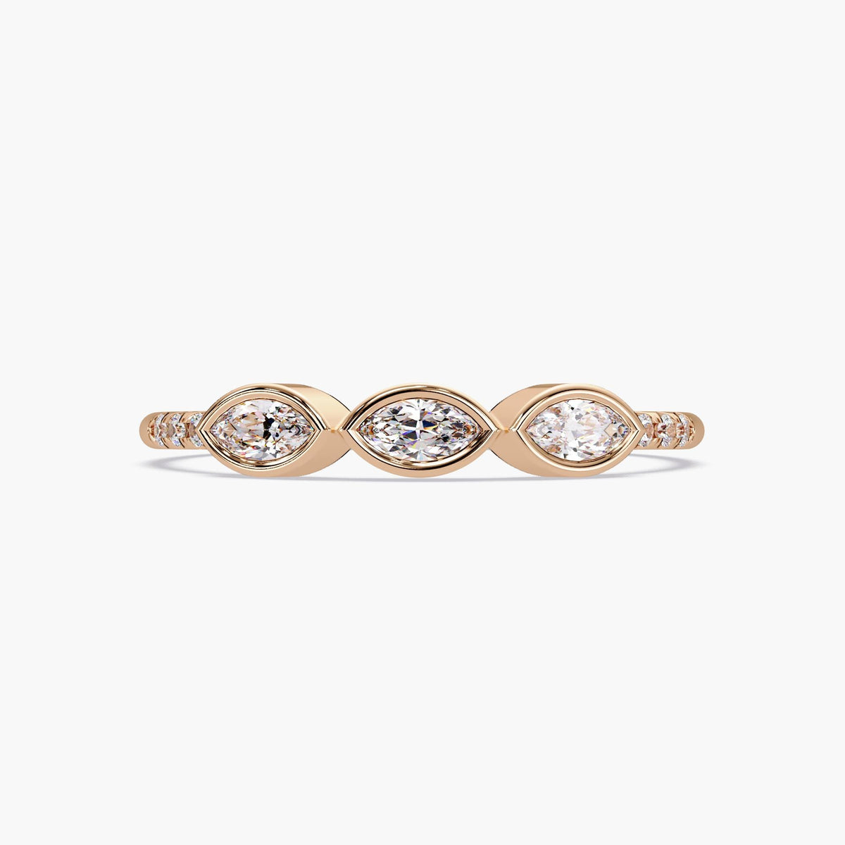 14K rose gold ring featuring three marquise diamonds set in bezel settings, with small round diamonds on the sides of the band.