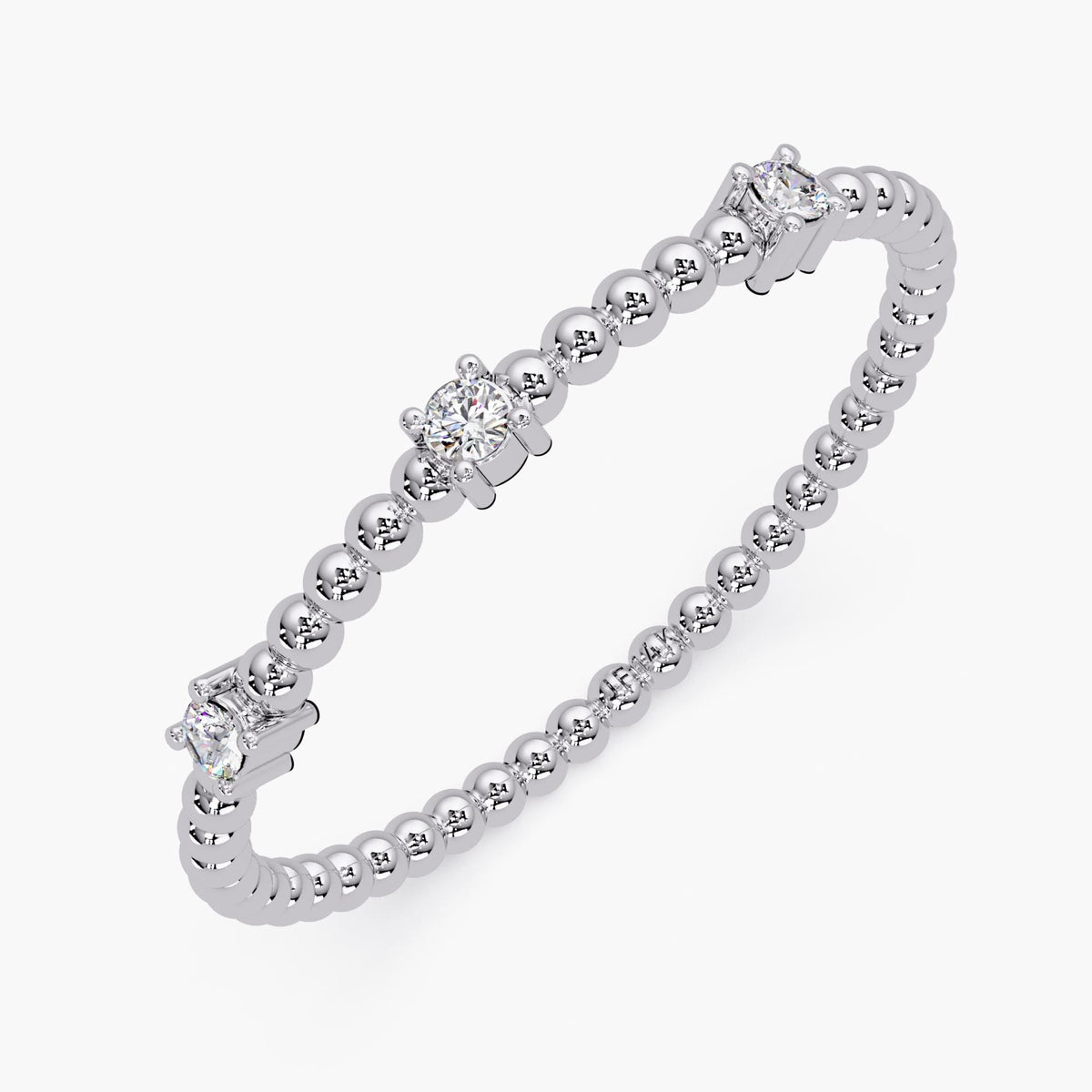 14K white gold beaded ring with three 1.5mm round diamonds, set in four-prong settings, featuring a 1.3mm band.