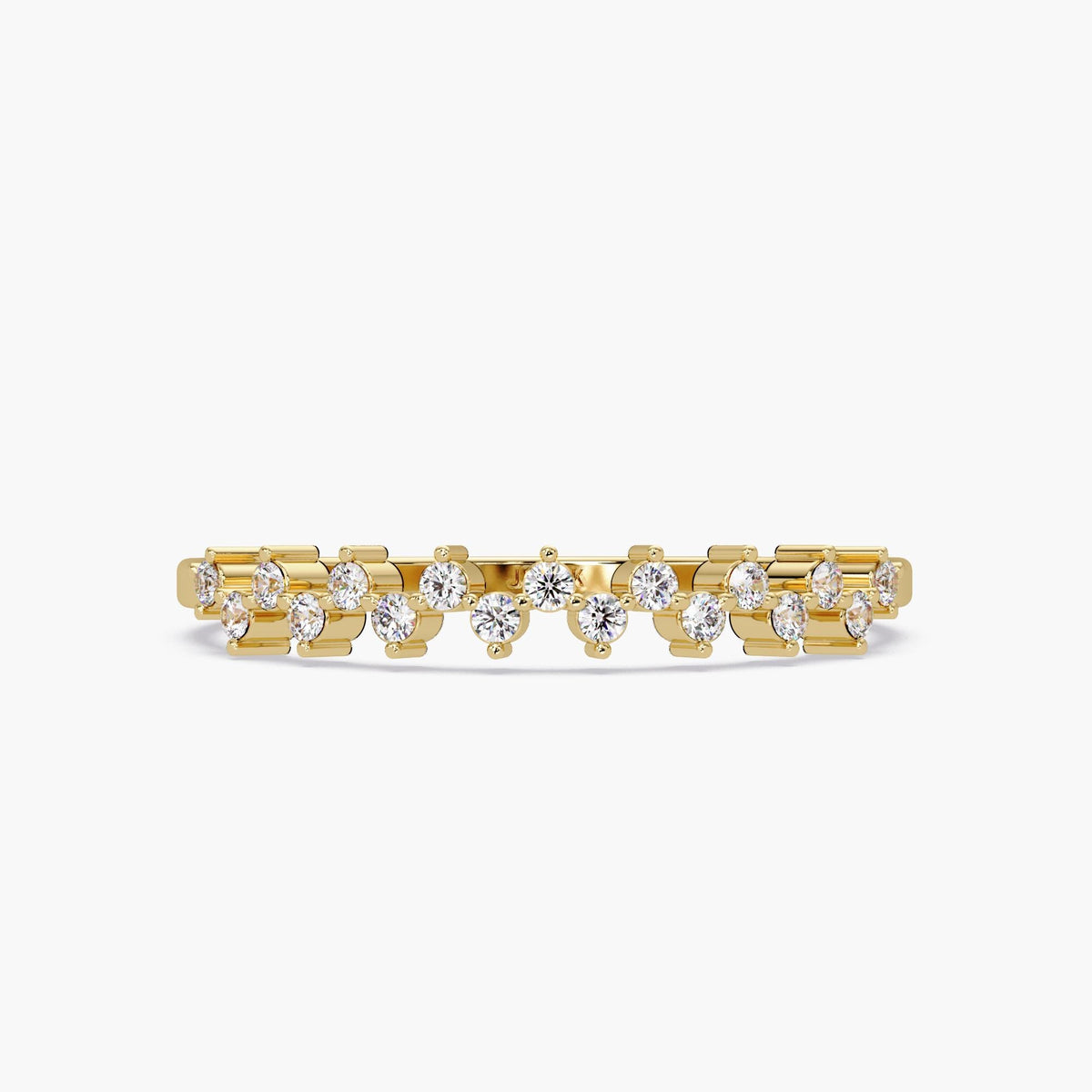 Front view of a 14K yellow gold zig zag ring featuring round bezel-set diamonds arranged in a wavy, symmetrical pattern across the band. The open, airy setting highlights each stone individually.