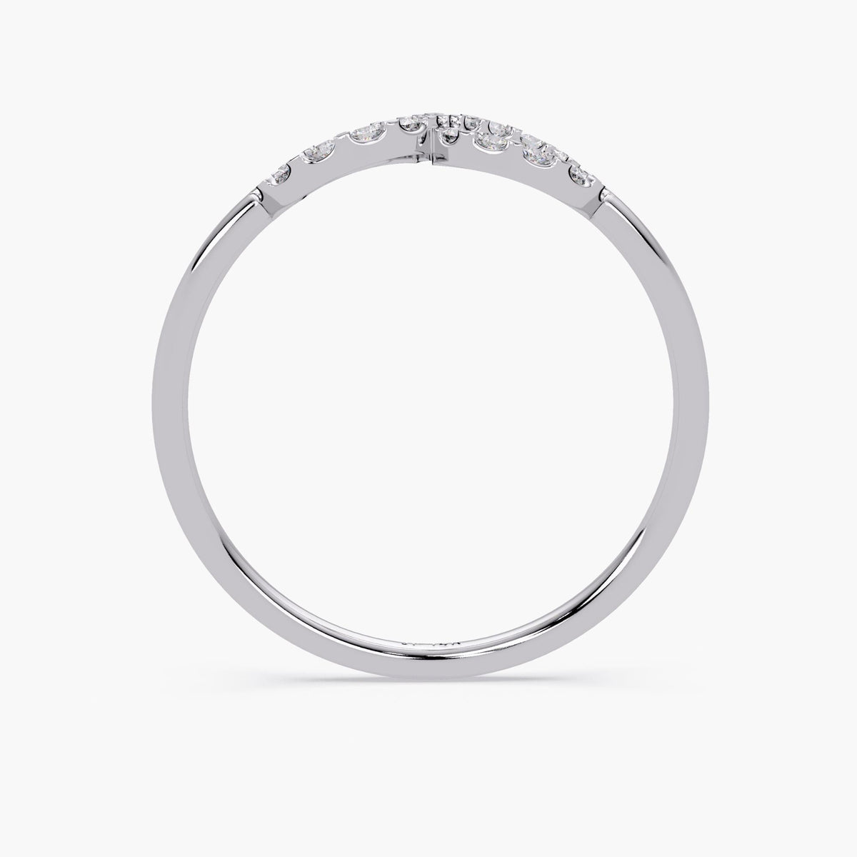 Side view of a 14k white gold infinity ring showing the low-profile pavé diamond setting and slim, polished band.