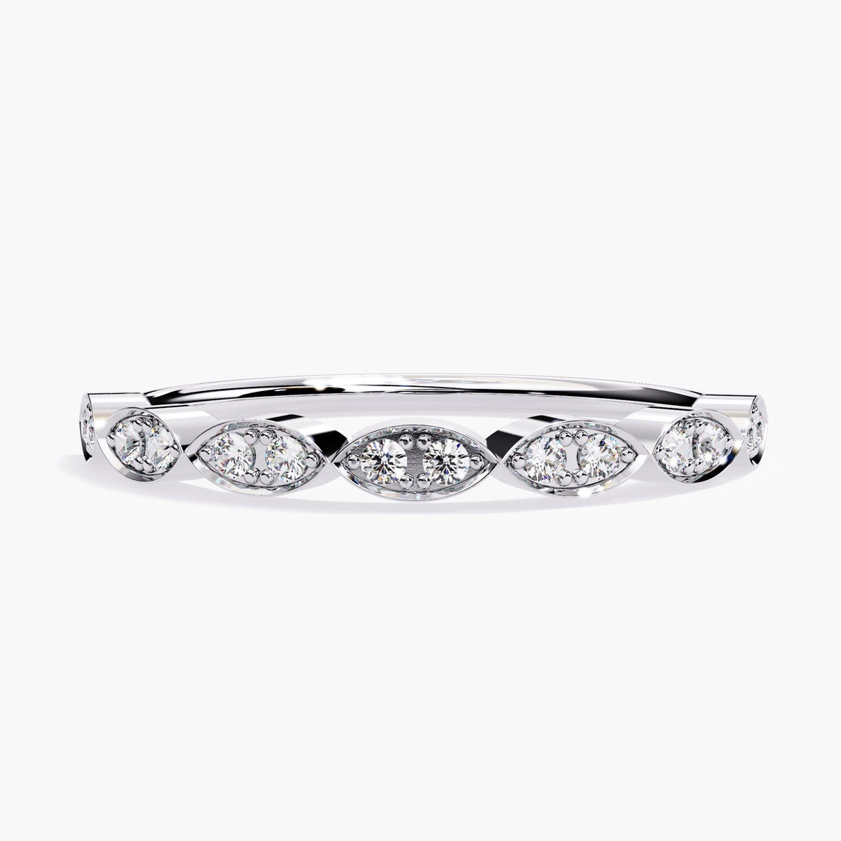 "A white gold ring featuring alternating marquise-shaped settings with round diamonds. The diamonds are surrounded by a delicate halo, creating a stunning and elegant look. The clean, polished band complements the intricate diamond arrangement, making this piece perfect for stacking or as a standalone wedding band, promise ring, or anniversary gift.