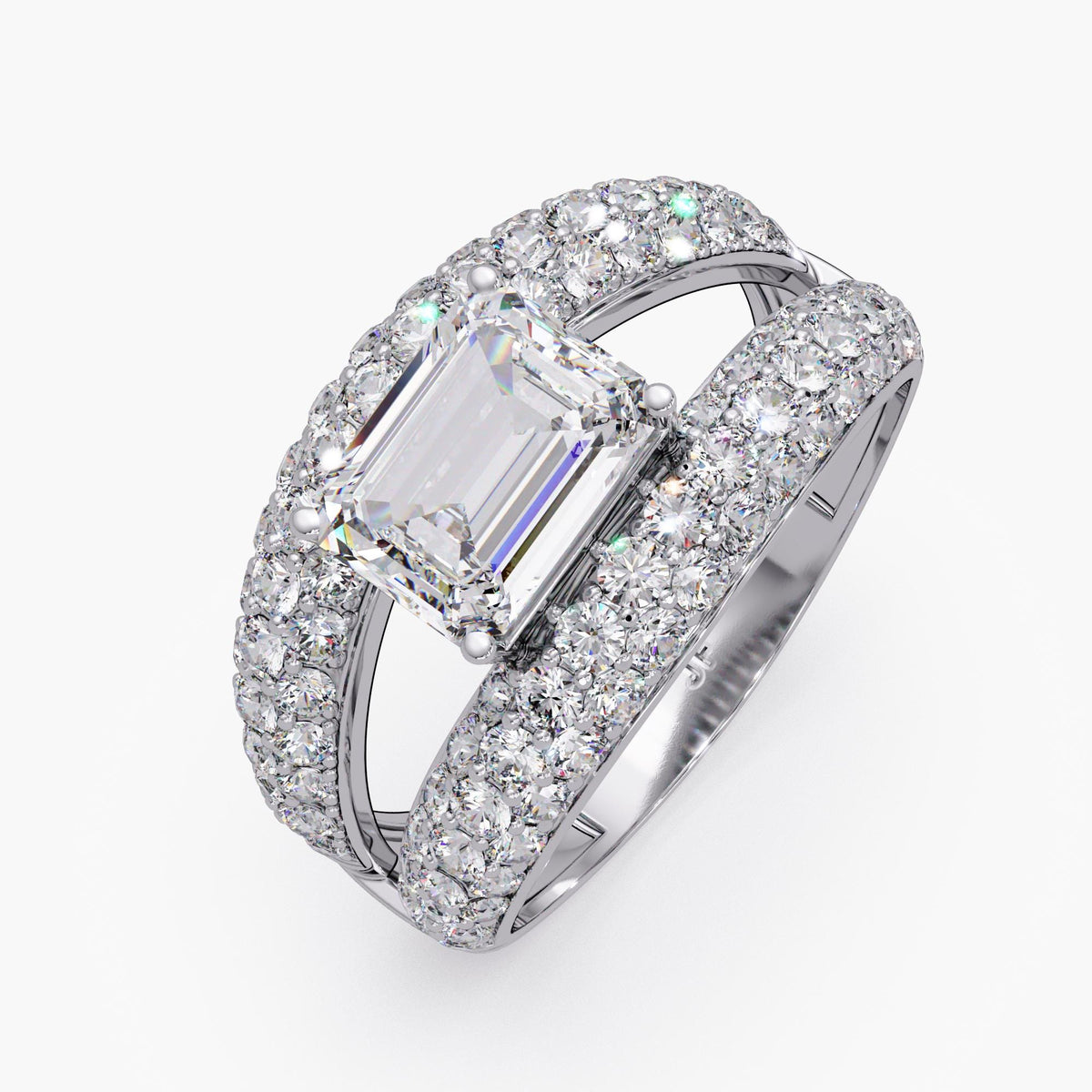 bold 14k white gold dome ring featuring an east-west emerald-cut lab-grown diamond, framed by two rows of pavé-set round diamonds with a signature open space on either side of the center stone, creating a modern floating effect.