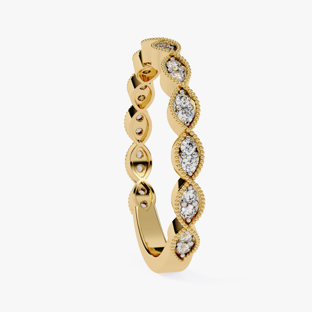 May include: A gold band ring with a row of marquise shaped diamonds set in the band. The diamonds are set in a pave setting and are surrounded by a row of small round diamonds.