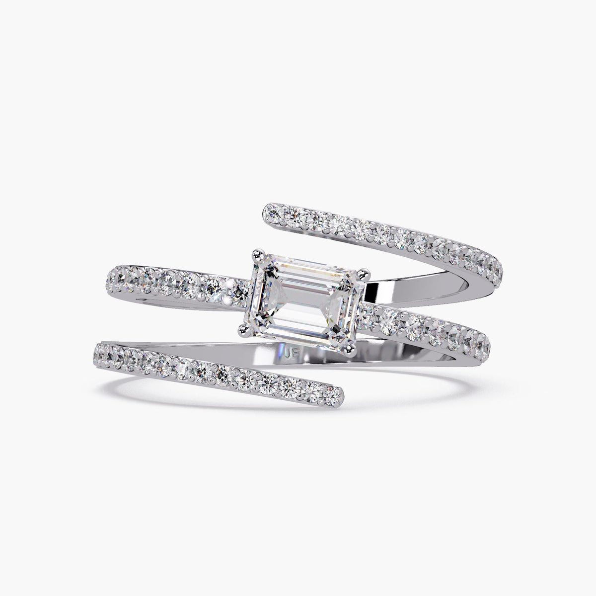 A 14K white gold wrap ring with a center emerald cut diamond and three rows of small round diamonds in a bypass setting. The open design wraps around the finger with sparkling pavé-set diamonds on each band. Excellent ring to wear as statement jewelry and on pointer finger