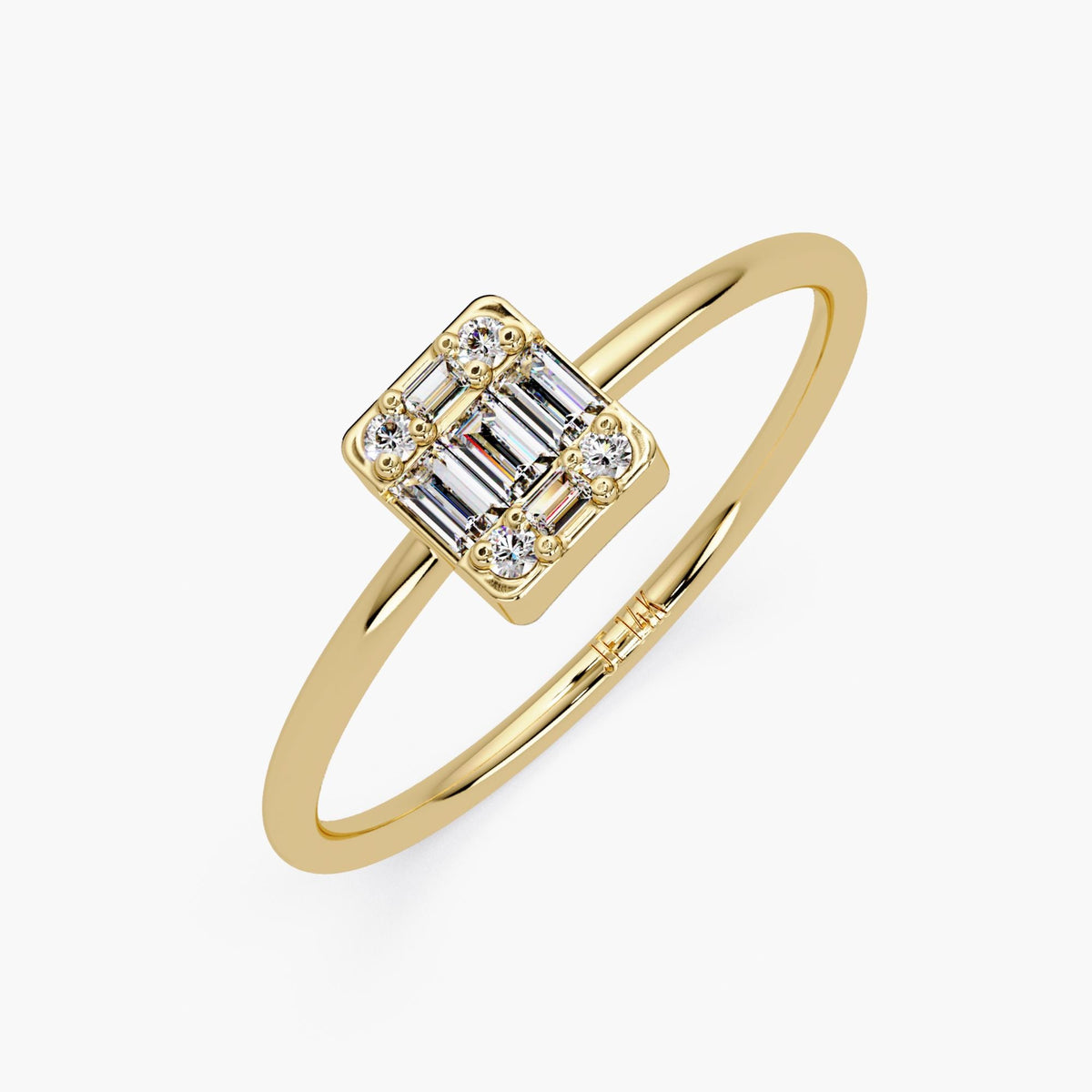 Tilted side angle of emerald illusion ring in 14K yellow gold