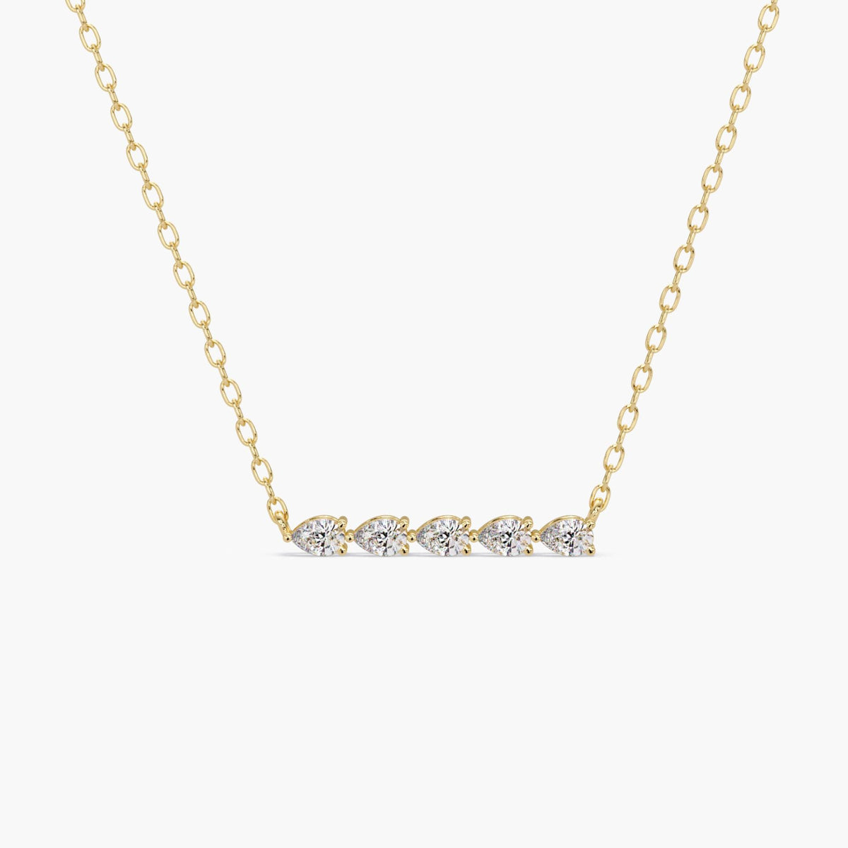 Front view of a 14k yellow gold necklace featuring five pear-shaped lab-grown diamonds in a horizontal bar layout, attached to a fine gold chain on both sides.