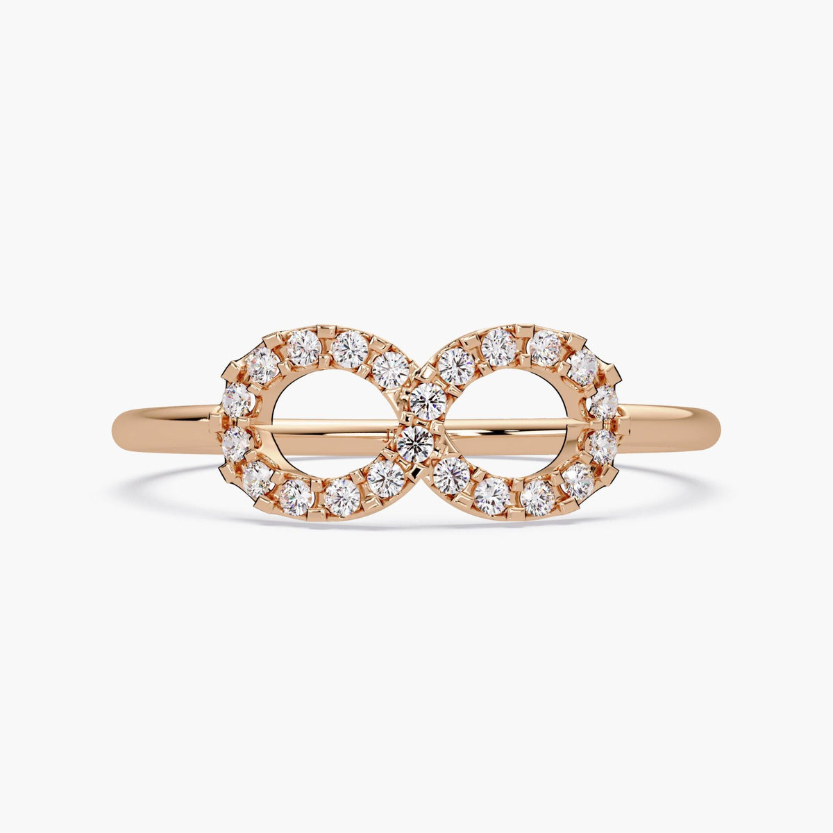 Front view of a 14k rose gold infinity ring featuring 22 round lab grown diamonds in a pavé setting, forming a double-circle infinity symbol on a polished band.