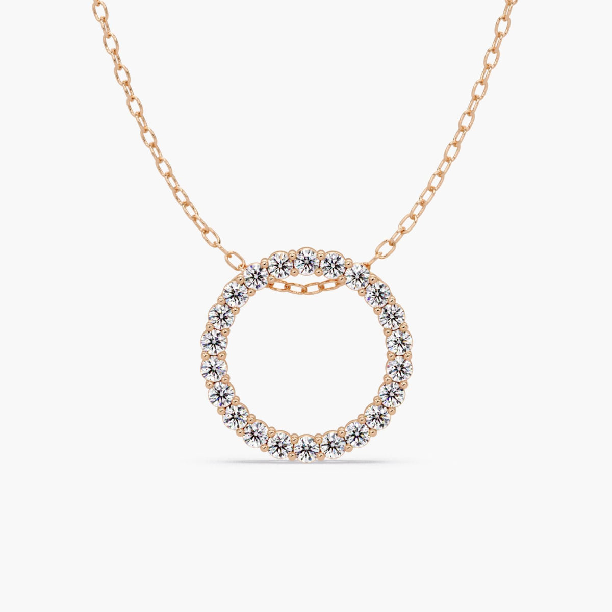 14k rose gold open circle pendant with natural round diamonds in a full eternity design, shown on a delicate cable chain.