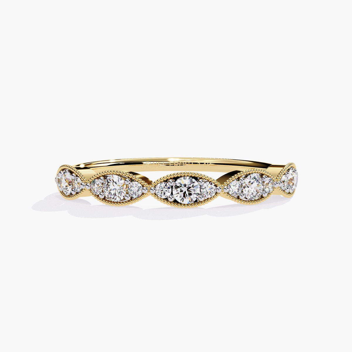 Front view of a 14k yellow gold band with five marquise-shaped bezels. Each bezel holds three round lab-grown diamonds. The fine milgrain edging and symmetrical layout give the ring a vintage, structured feel. It’s a graceful choice for a wedding band, anniversary ring, or everyday stack.