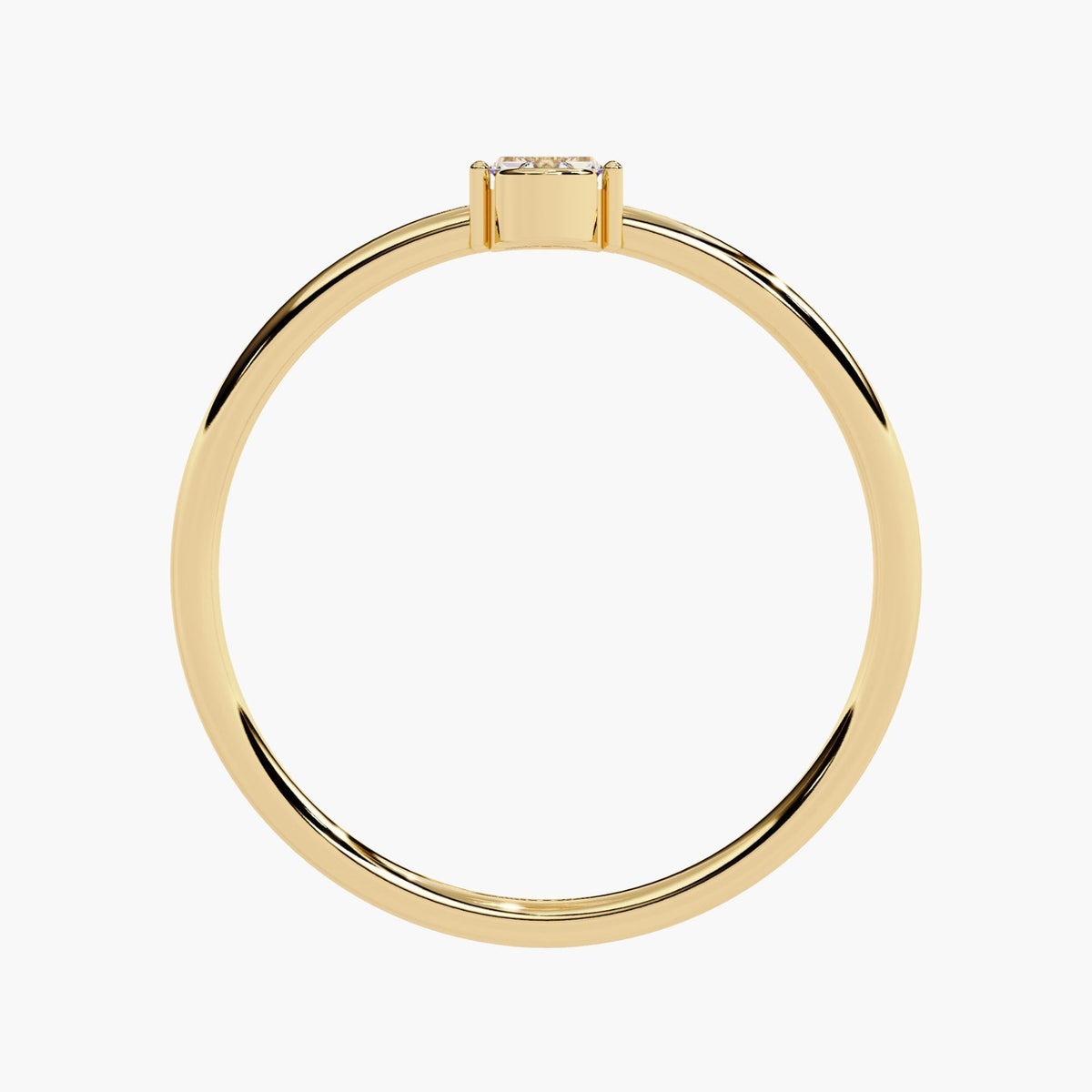 Top-down view of a 14k yellow gold ring showing the slim 1.3mm band and low-profile setting. Only the top edge of the horizontal baguette diamond is visible, emphasizing the ring’s minimalist structure and delicate scale—ideal for stacking with other dainty bands or wearing as an understated everyday piece.