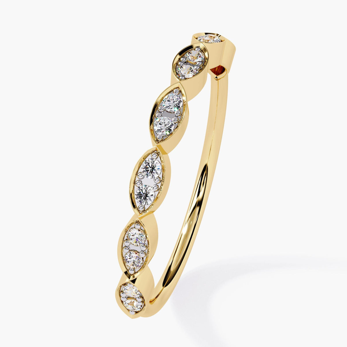 A yellow gold marquise wedding band featuring 14 round natural diamonds, each set in a bezel pave setting. The diamonds are arranged in an elegant marquise pattern along the band, adding a touch of sophistication. The 14K gold band is 2.2mm wide, offering a sleek and modern look. This dainty half eternity ring is perfect as a wedding band, promise ring, or anniversary gift, showcasing timeless beauty with its clean, minimalist design.