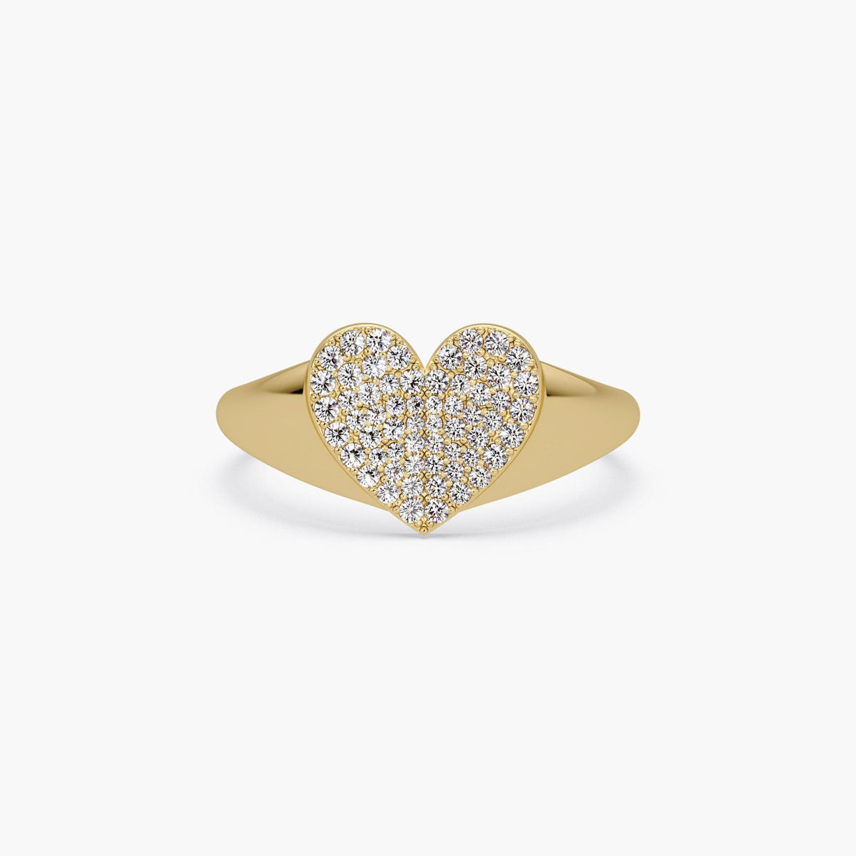 A yellow gold ring with a flat heart centerpiece fully pavé-set with small round natural diamonds. The heart has a sculpted V-shaped dip at the top and is set on a tapered solid gold band.
