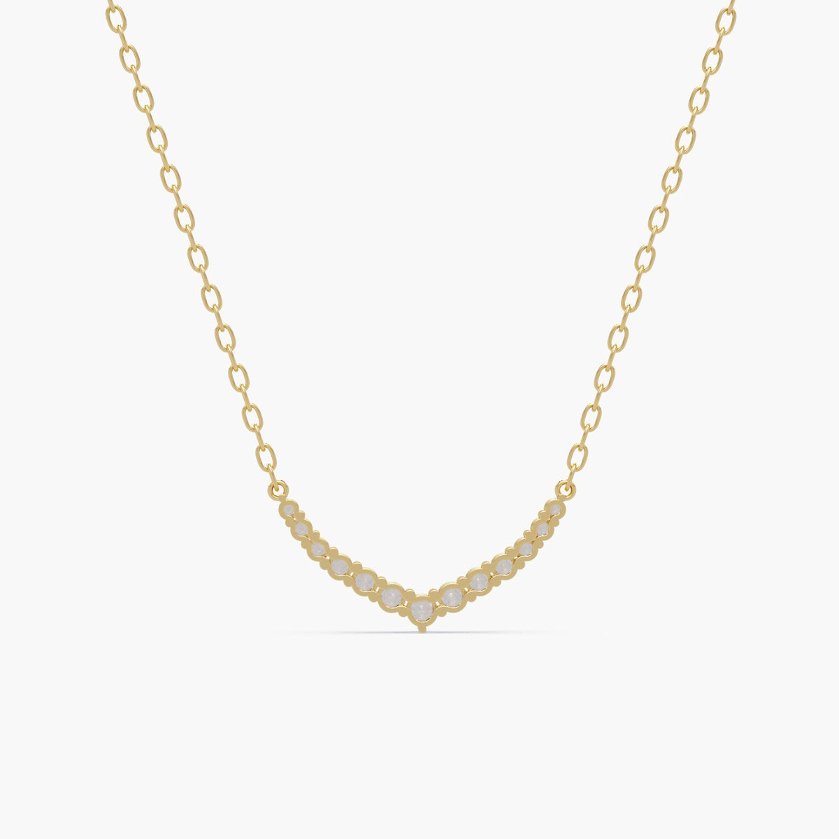 14k gold chevron diamond necklace, showing the basket settings for each round diamond along the curved V-shaped pendant.