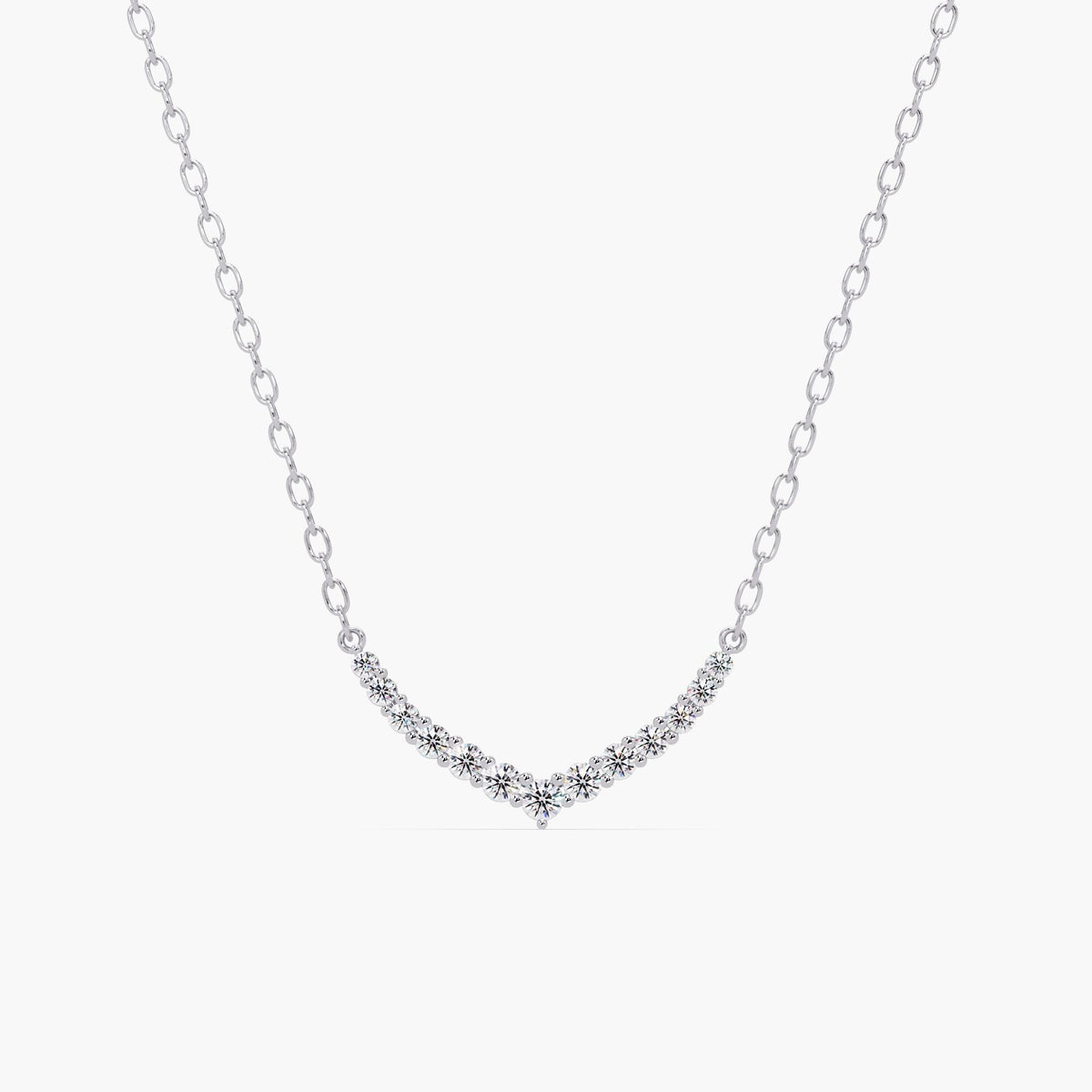 14k white gold V-shaped chevron necklace with round lab grown diamonds set in a curved bar pattern. The necklace features a delicate gold chain and a symmetrical diamond layout, forming a soft point at the center.