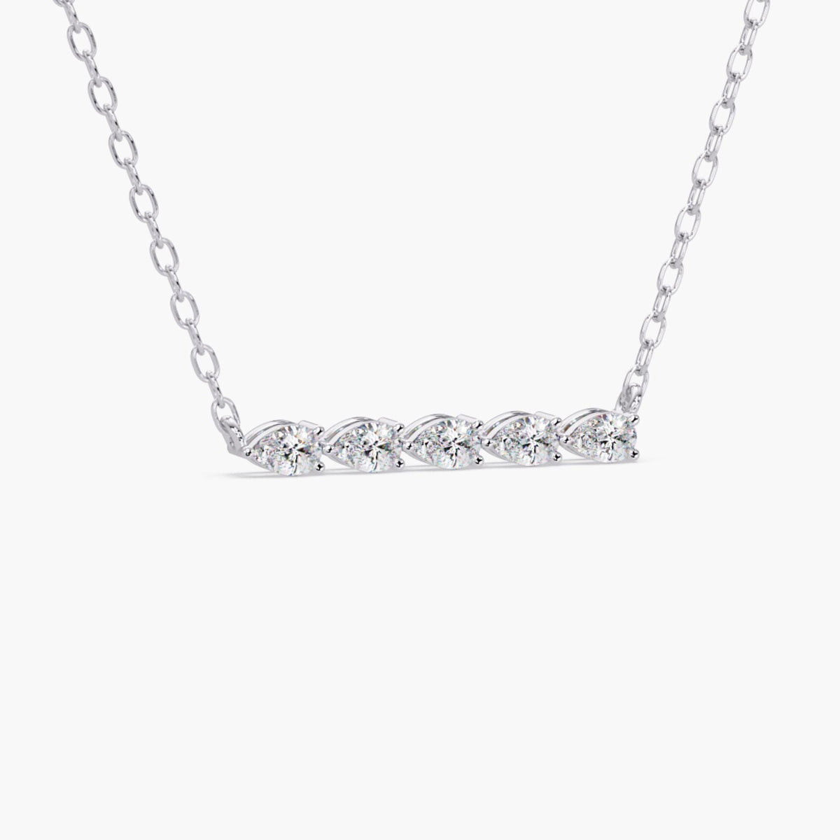 14k white gold necklace with five pear-shaped lab-grown diamonds set in a horizontal bar design. The diamonds are prong set and evenly spaced along a delicate white gold chain, creating a dainty and minimalist look.