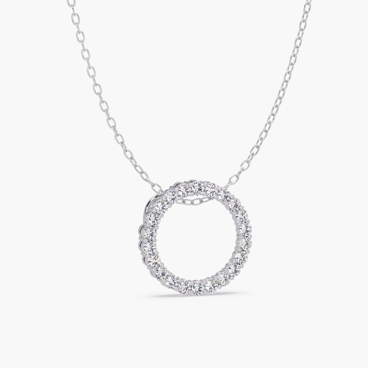 14k white gold open circle pendant with natural round diamonds in a full eternity design, hanging from a fine cable chain.