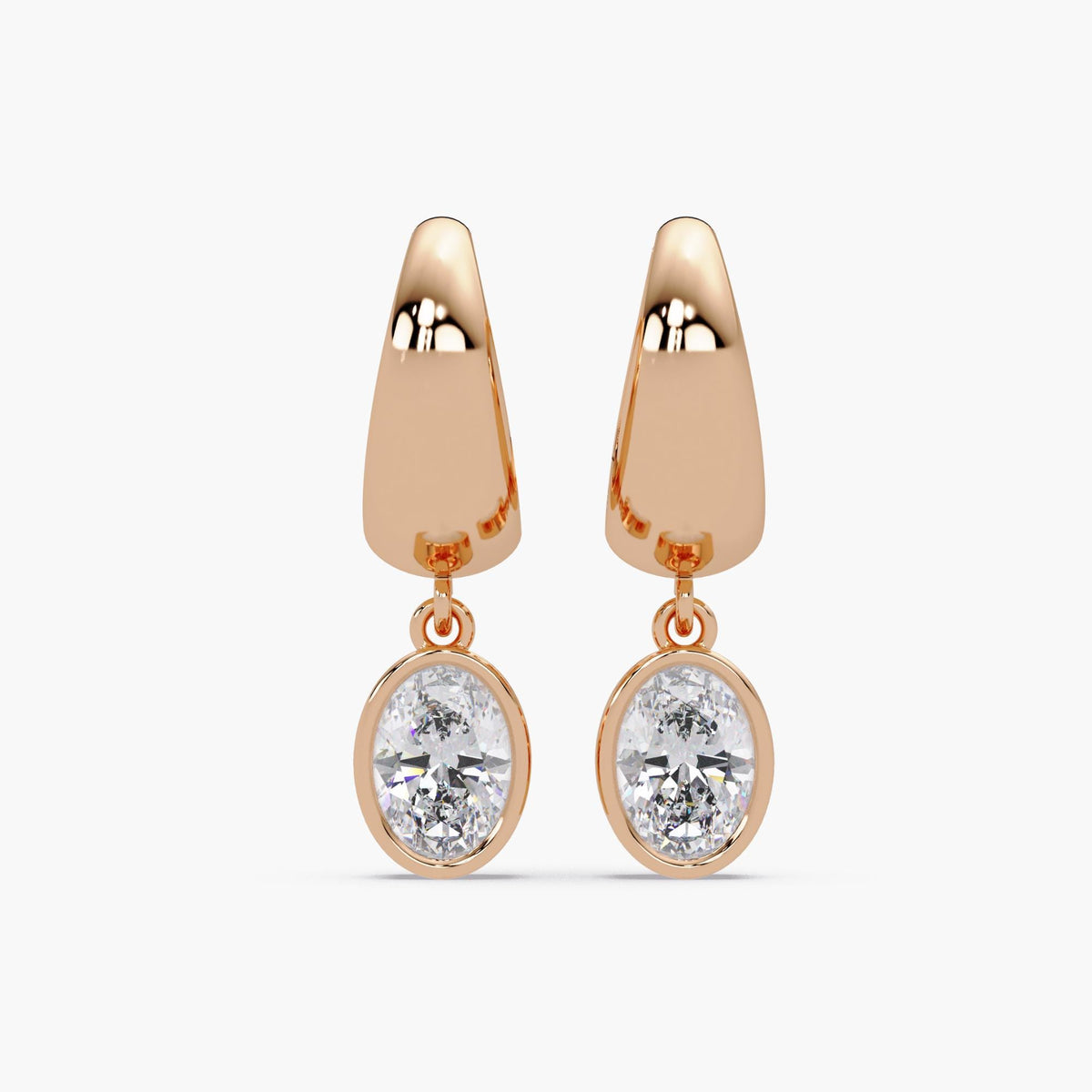 14K solid rose gold chunky hoop earrings with bezel set oval lab grown diamonds, 3 carat total weight. Dangle earrings for women, shown in white gold finish. Suitable for weddings, formal events, office wear, or gifting. Commonly purchased as bridal earrings, anniversary gifts, or special occasion jewelry.