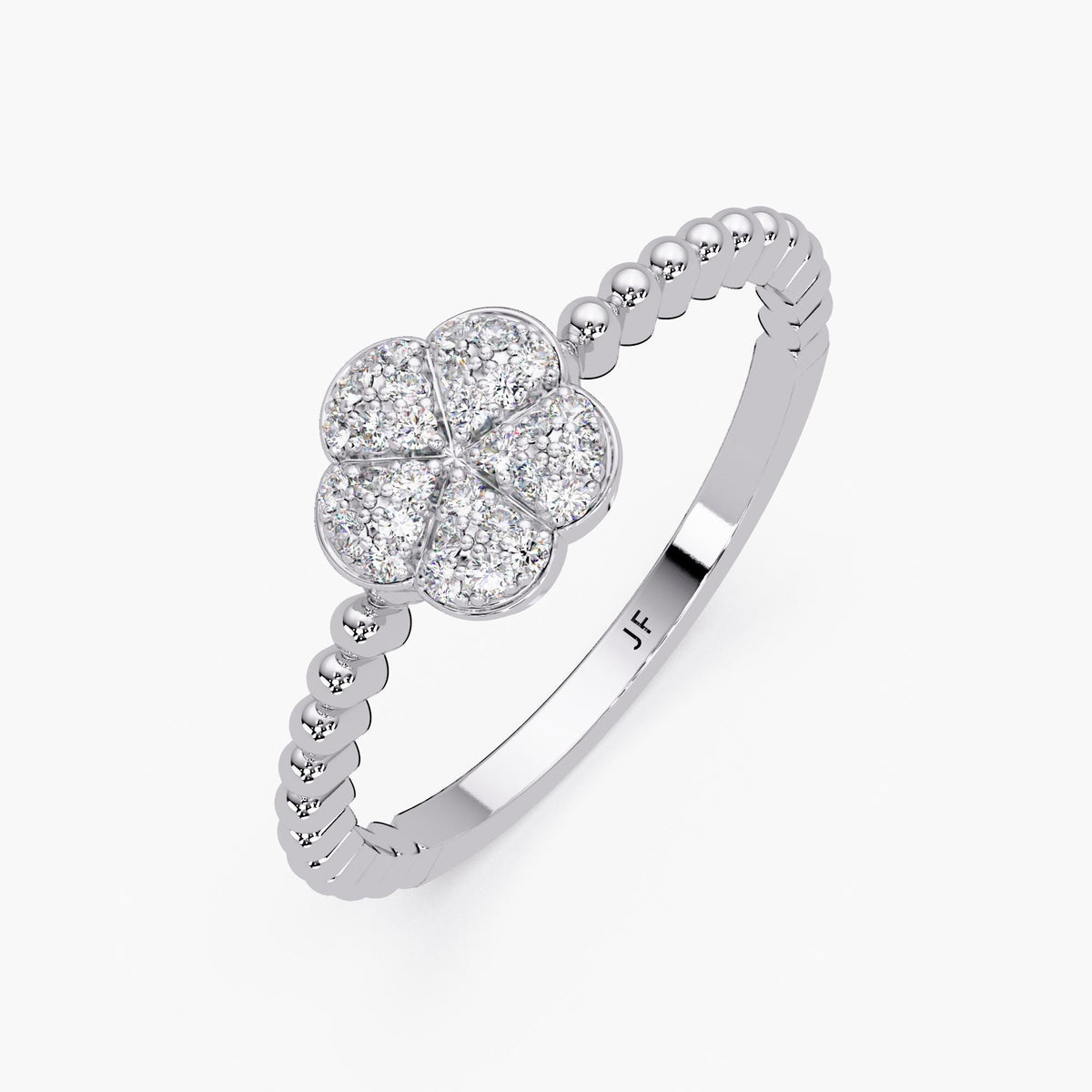 14k white gold flower ring featuring pavé-set diamonds in five softly contoured petals. The band transitions from a polished lower shank engraved with 'JF' to a beaded upper half, adding texture and balance to the delicate, high-shine floral design.